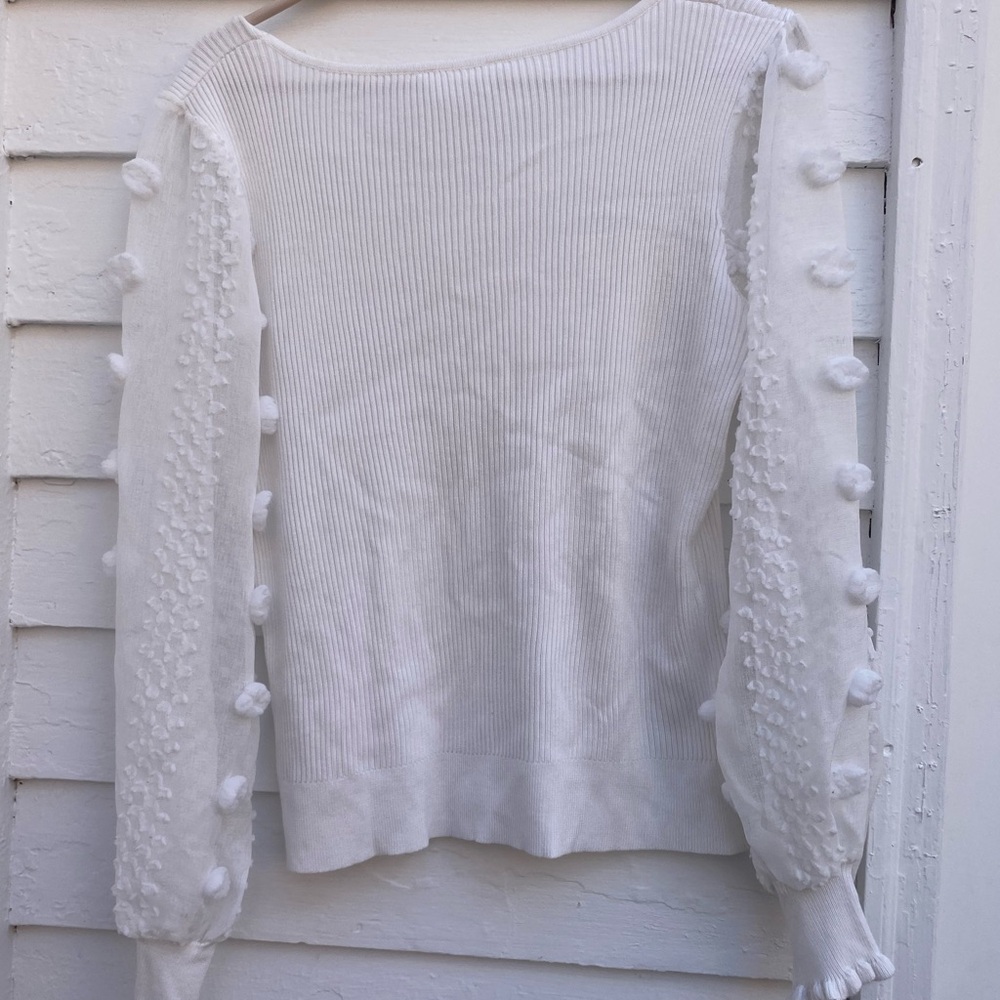 Elegant White Knit Women's Top with Sheer Sleeves and Pom-Poms - Picture 5 of 6